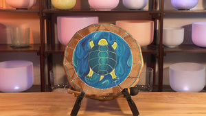 “Nurturing” 15 inch Turtle Painted Indigenous Hand Drum:  The Turtle is amazing and beautiful. Thirteen sections represent the thirteen moons in a calendar of a year. Life is all about balancing and nurturing relationships that promote respect and love for all of us. 